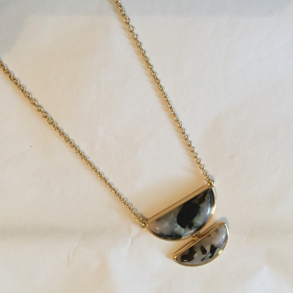 Gold tone pendant necklace